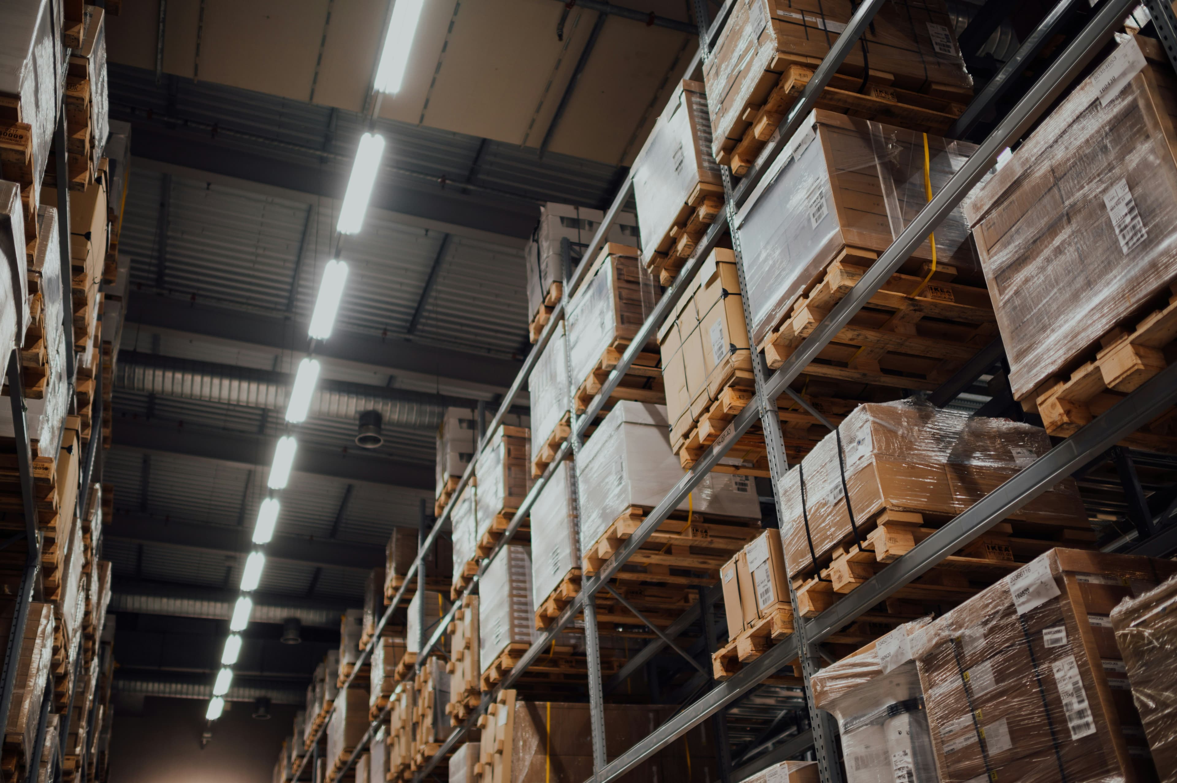 Warehouse pallet racking stocked with wrapped inventory